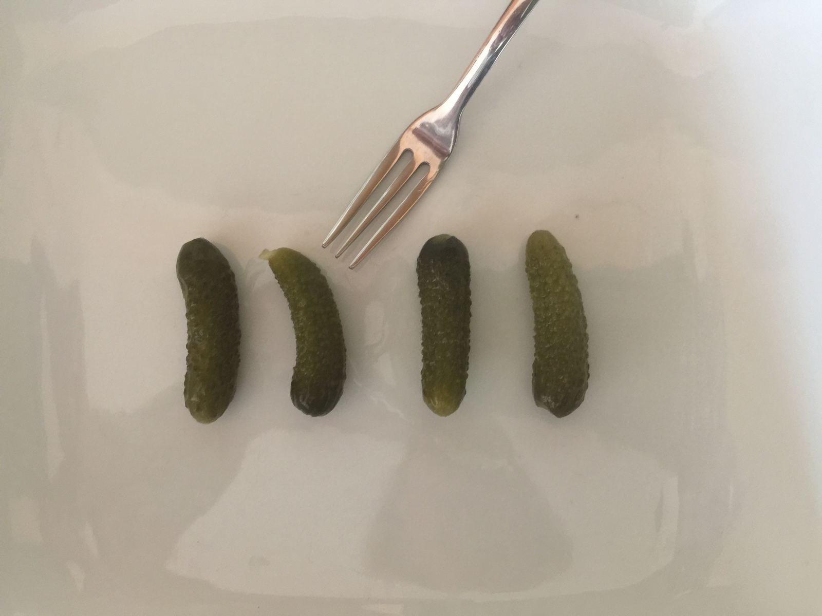 Four Giant Pickles